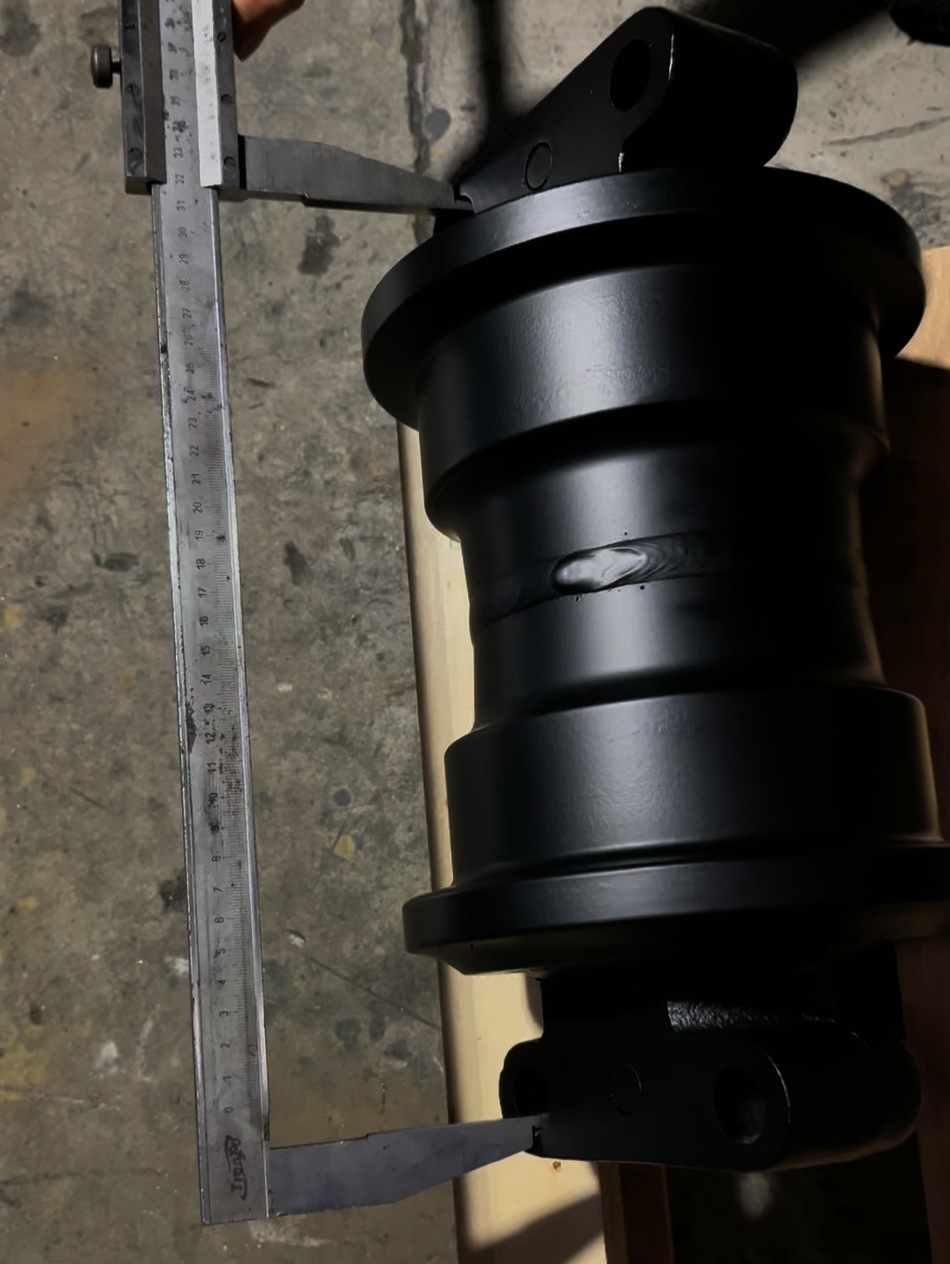 Track roller mounting hole spacing